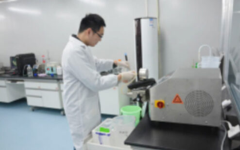 Technician working at a biosafety cabinet